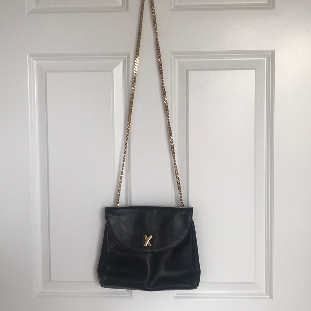 Black leather bag with gold chain
